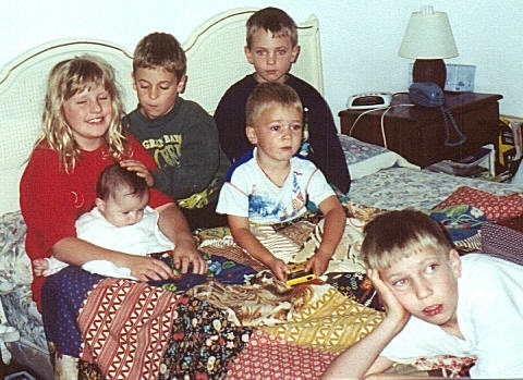 First morning at home - on parents' bed